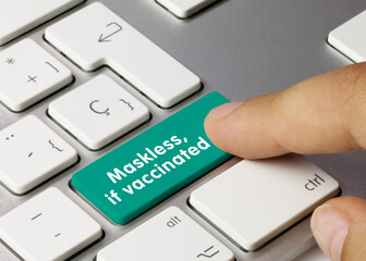 Maskless, if vaccinated - Inscription on Green Keyboard Key.