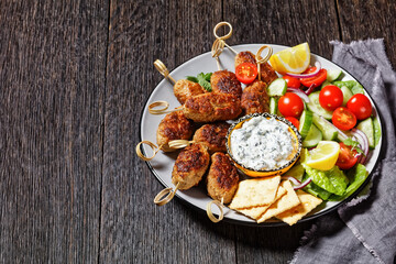 Spicy lamb and feta kofta skewers, top view