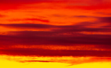 Colorful sunset with clouds in the sky.