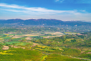 Obraz premium Monte Soratte in Sant'Oreste (Italy) - The beautiful landscapes with old hermitages in the mountain natural reserve in province of Rome, Sabina area, during the spring.