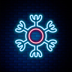 Glowing neon line Snowflake icon isolated on brick wall background. Colorful outline concept. Vector