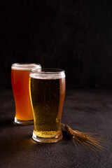 Two glasses of cold beer on the table
