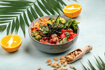 Organic hawaiian tuna poke bowl with rice and vegetables