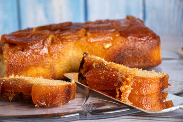 Home made apple cake and slice of cake on spatula