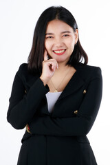 Young and cute businesswoman pose in thinking gesture by using finger touch cheek and look at camera