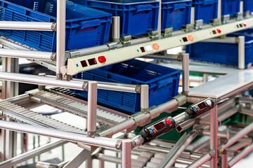 basket or plastic box container on roller rack or aluminum shelf with electronic display smart...