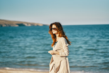 Fototapeta na wymiar woman tourism travel sea sand beach mountains fresh air relax