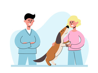 Veterinarian and owner with her happy dog at vet appointment.