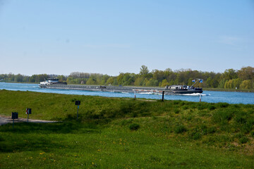 large transport container ship sails across the rhine