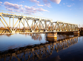 Fototapeta na wymiar River with a railway bridge