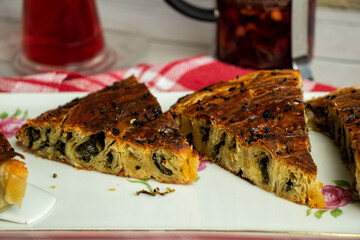 A close-up view of spinach patty slices