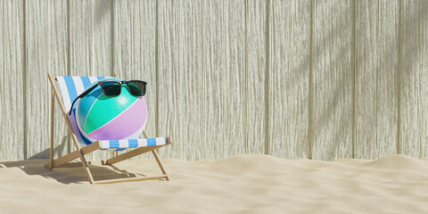 Beach ball with sunglasses on a beach chair