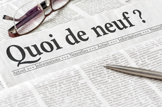 A newspaper with the headline What is new in french - Quoi de neuf