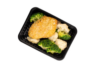 Lunch box with broccoli, cauliflower and chicken cutlet. Food delivery. Top view. Isolated. Plastic container take away with cooked broccoli, cauliflower and chicken cutlet