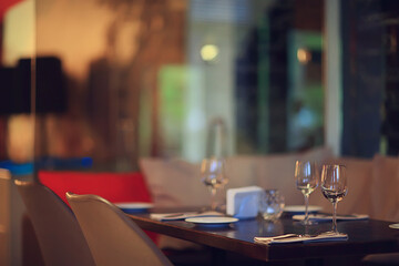 abstract background, restaurant concept blurred background evening food fork, knife, cutlery, table setting