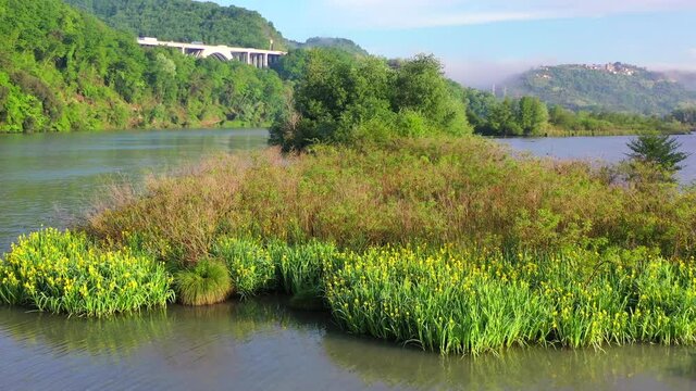 Tevere Farfa Nature Reserve, Nazzano, Lazio, Italy.
The river valley of the Tiber north of Rome. Aerial view with drone in 4K