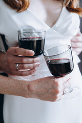 person holding a glass of wine