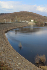 Fototapeta premium View accross the Gileppe Dam and Gileppe Lake near Jalhay in Wallonia, Belgium. The arch gravity dam is the highest in Belgium.