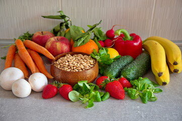 Healthy fruits and vegetables on kitchen desk