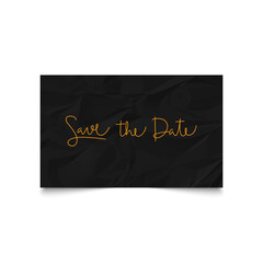 Save the date hand lettering on black crumpled paper