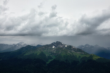 Obraz na płótnie Canvas Landscape green mountain valley on a grey cloudy day