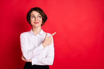 Photo of happy dreamy charming positive girl in glasses look copyspace advertisement isolated on...