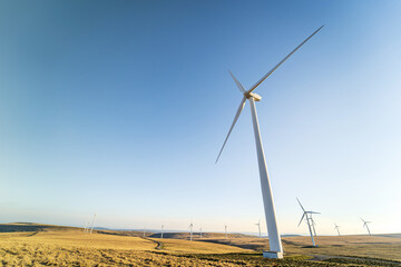 Wind turbines of Mynydd y Betws wind farm, Swansea, Carmarthenshire, South Wales, UK. Sustainable...