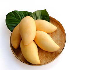 Mangoes fruit in rattan basket on white Background