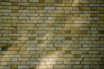 Texture background of yellow brick wall