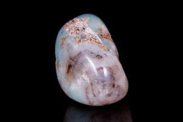 Macro Mineral Stone Amazonite on a black background