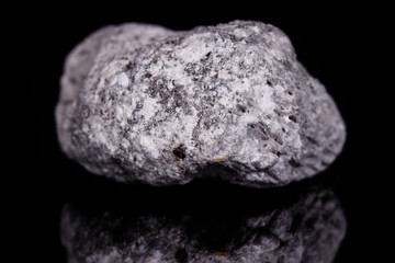 Macro mineral stone Pumice on black background