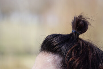 Woman hair topknob close up view
