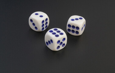Dices on black table w
