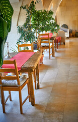Beautiful interior decoration with wooden tables and chairs