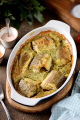 White fish hake baked in egg, milk and flour.
