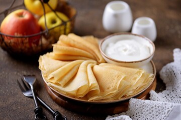 Thin pancakes with semolina, eggs, milk and wheat flour.