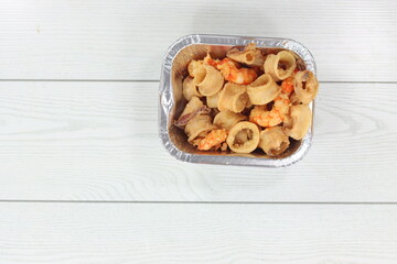 mixed fried tray pan of mixed fried squid and shrimp fish market