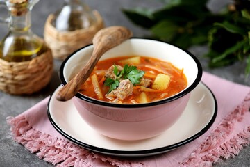 Soup with veal, cabbage, turnips, onions, carrots, potatoes and tomatoes.