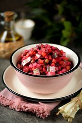 Traditional salad Vinaigrette with salted fish, beets, potatoes, carrots, pickles, onions and vegetable oil.