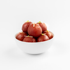 gulabjaamun or gulaabjamun in a white bowl on white background useful for food product packaging or social media.
