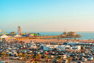 Panoramic views of Santa Monica and the beach at sunset, and fully filled parking on the weekend. Los Angeles, USA - 15 Apr 2021