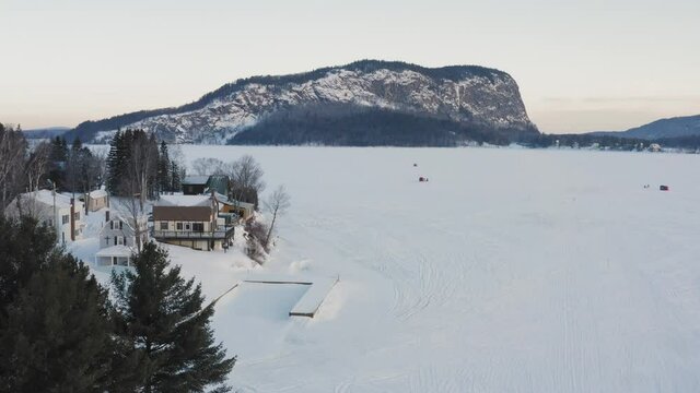 Breathtaking View Of Mount Kineo In Winter Snowfall Looking Over Frozen Lake Moosehead 