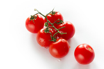 cherry tomatoes on a white background