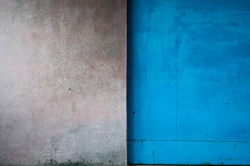 Old cement wall texture and blue half split