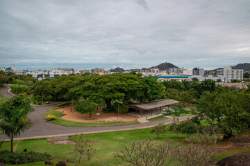 Fototapeta na wymiar view of the city, mountain and tropical trees
