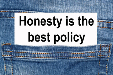 Back pocket of jeans with honesty is the best policy card