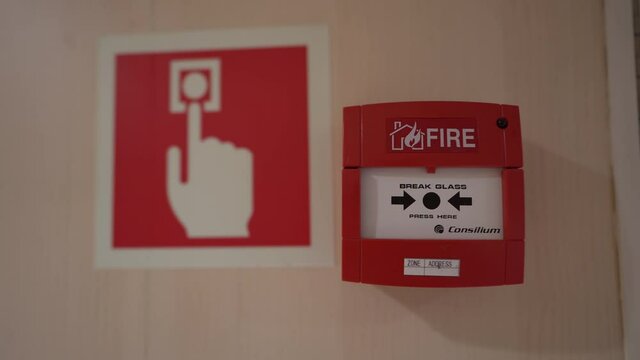 Fire alarm box Break Glass Call Point mounted on wall