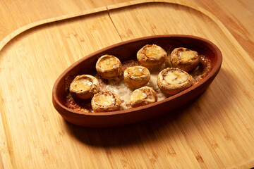 Baked white mushrooms in butter