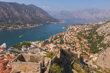 Fototapeta na wymiar Beautiful view of the city of Kotor from the Castle Of San Giovanni on a sunny day. Montenegro 