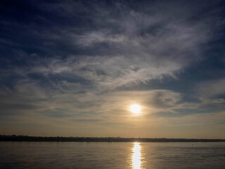 At sunset, the Mekong River.